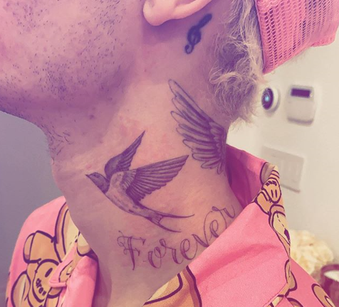 justin beiber neck tattoo